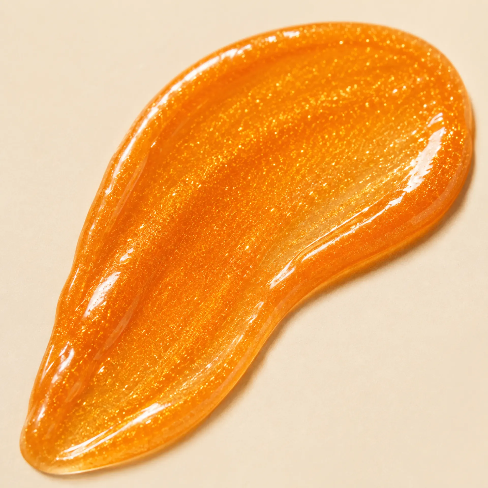 Shimmer Sun Elixir texture — golden dry oil